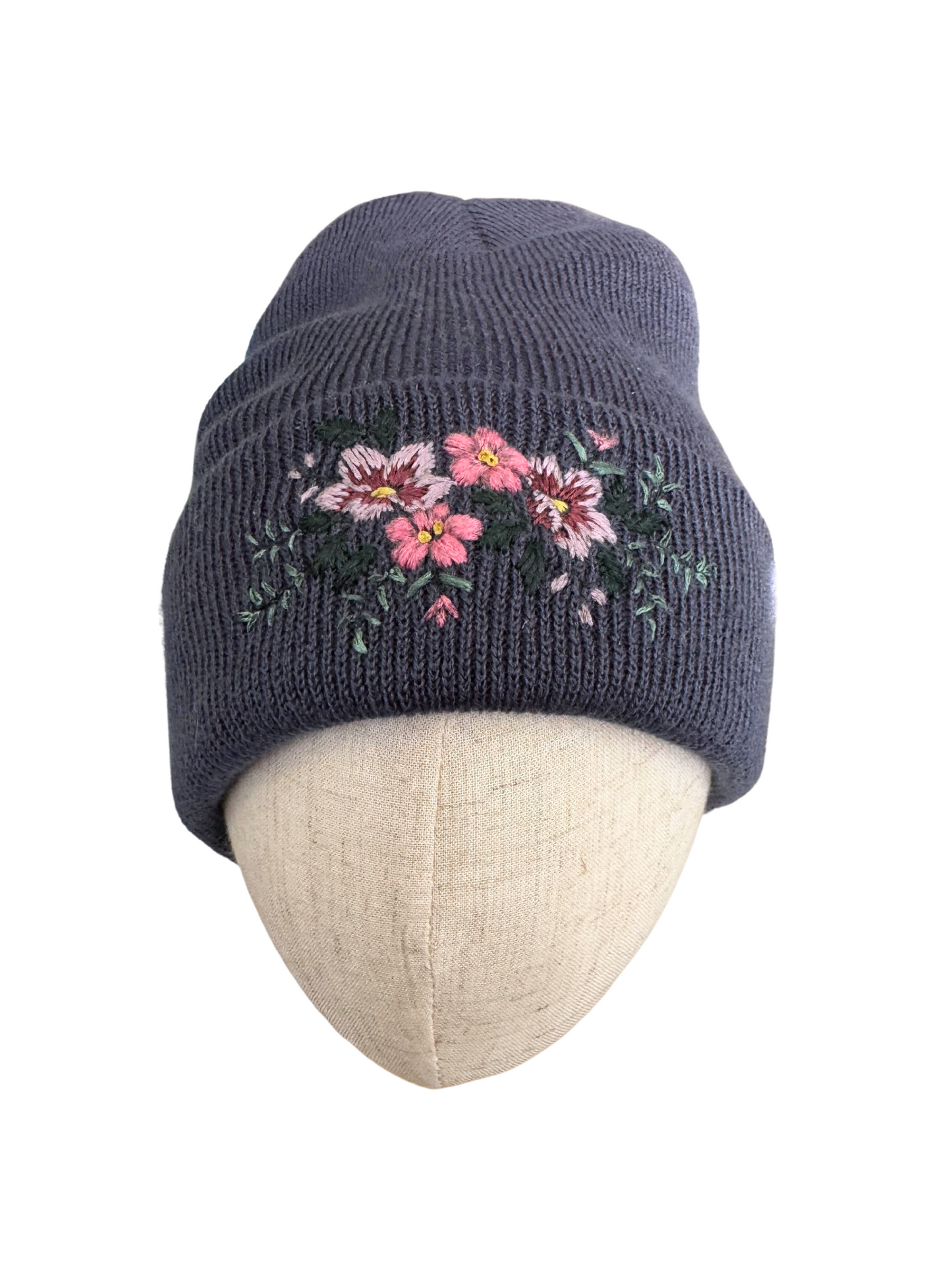 Hand embroidered floral beanie with pink wildflower design, premium artisan winter hat.