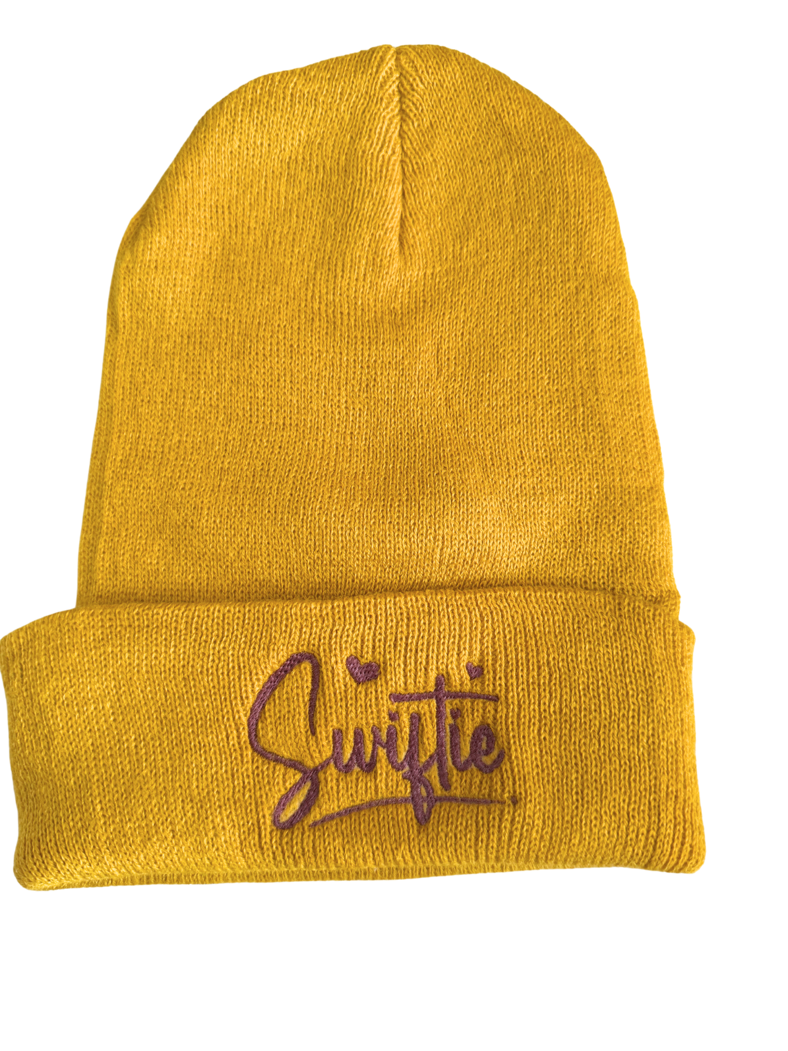 Mustard yellow beanie with purple "Swiftie" embroidery.

