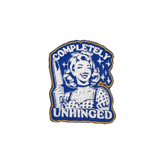 Handmade "Completely Unhinged" iron-on patch featuring a retro character with a cleaver, blue and white embroidery, ready to ship.

