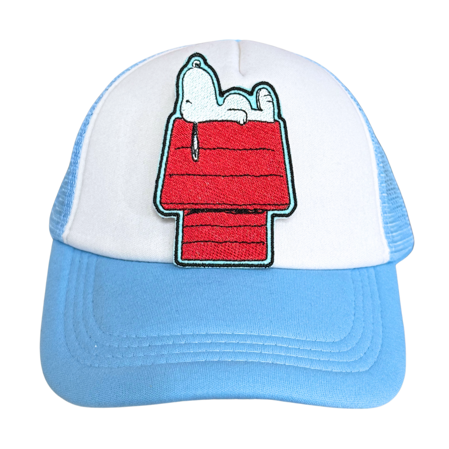 Light blue and white trucker hat with an embroidered patch of a lounging dog on a red doghouse.

