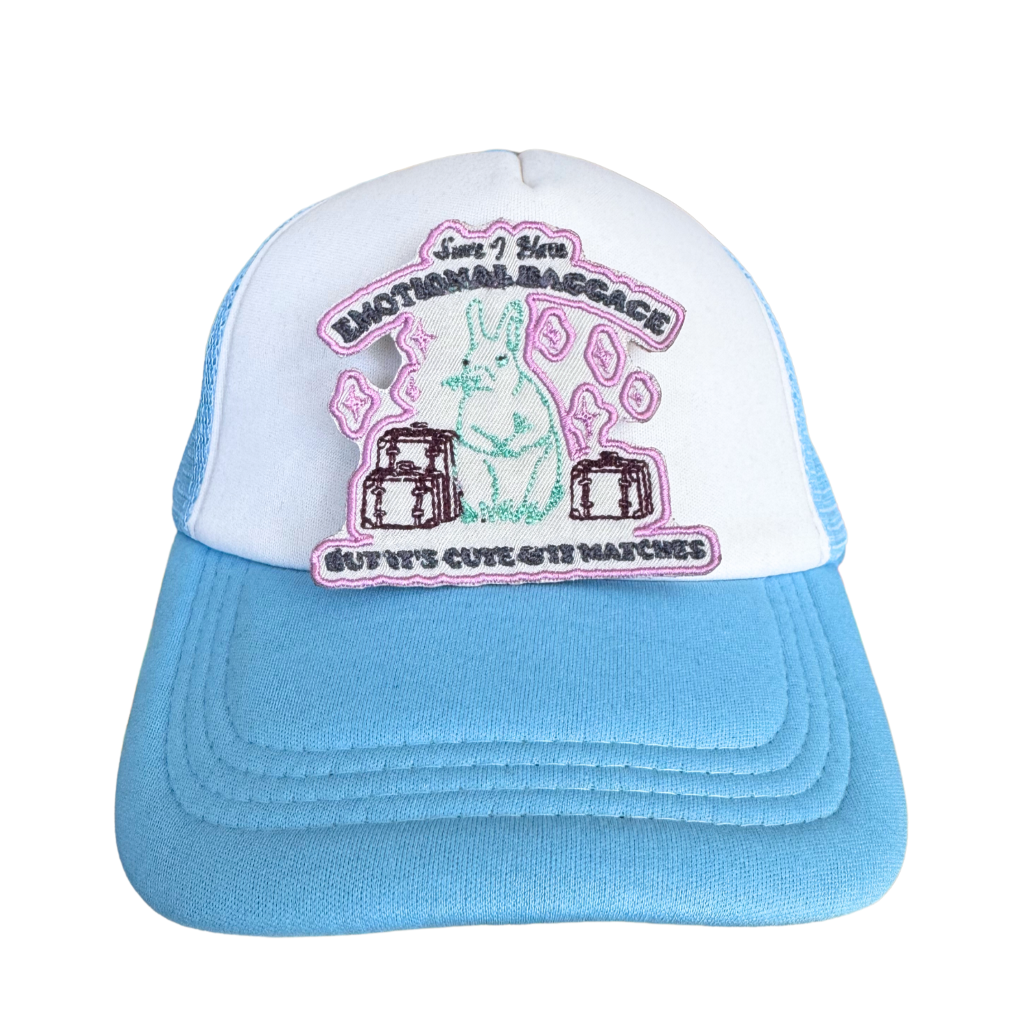 Trucker hat featuring the "Sure, I Have Emotional Baggage, But It’s Cute and It Matches" patch with a bunny and luggage design.
