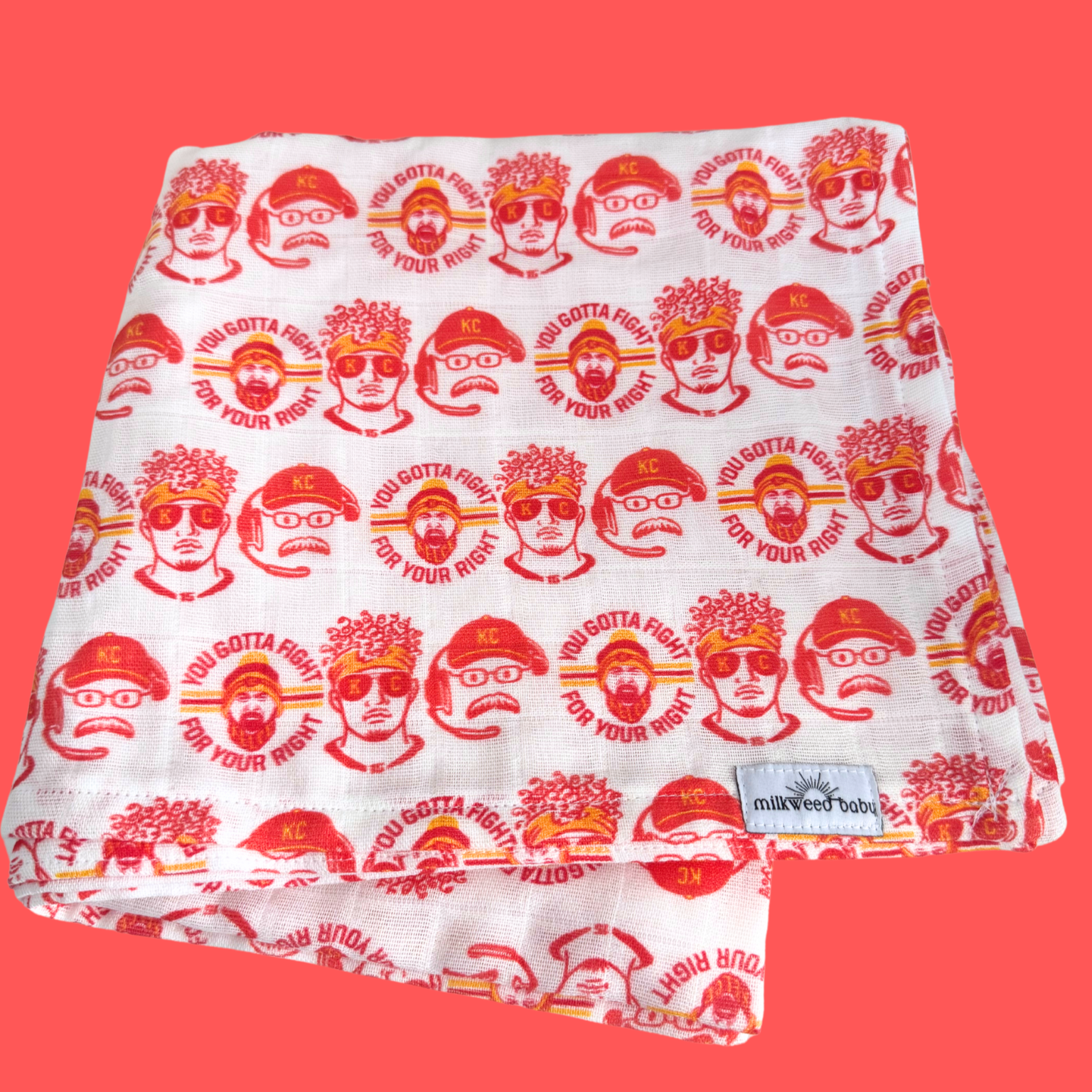 KC Chiefs-inspired baby swaddle blanket displayed on a red background, featuring Patrick Mahomes, Travis Kelce, Andy Reid, and the phrase "You Gotta Fight for Your Right" in a repeating pattern.

