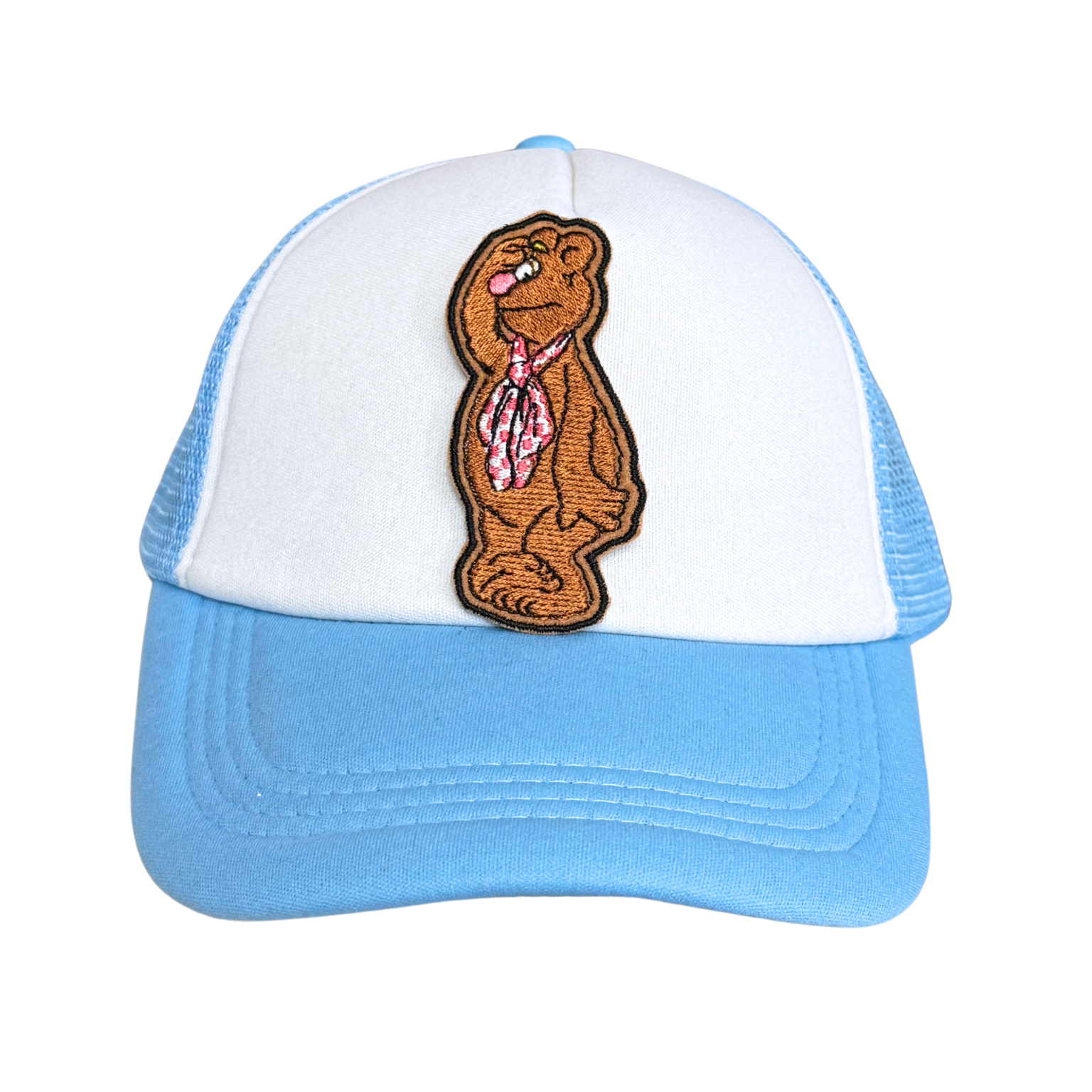 Light blue and white trucker hat with an embroidered bear patch attached.

