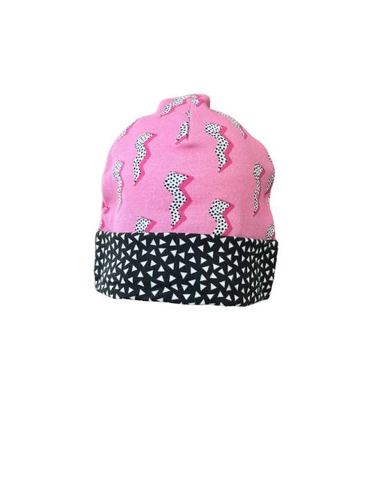 Organic cotton baby beanie with lightning bolt and triangle design on pink background, handmade for 0-3 months, Kansas City.