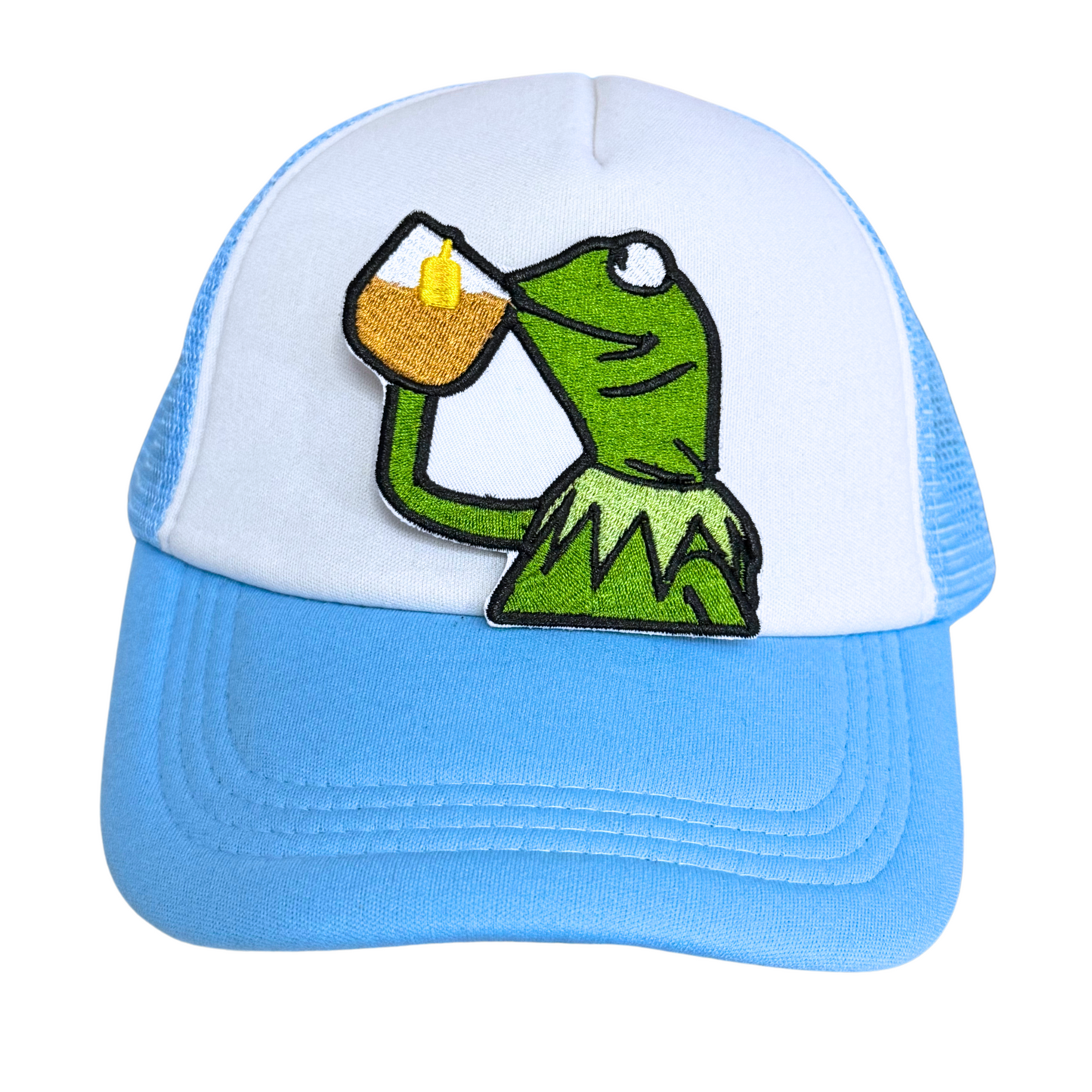 Light blue and white trucker hat with an embroidered "sipping tea frog" patch attached.

