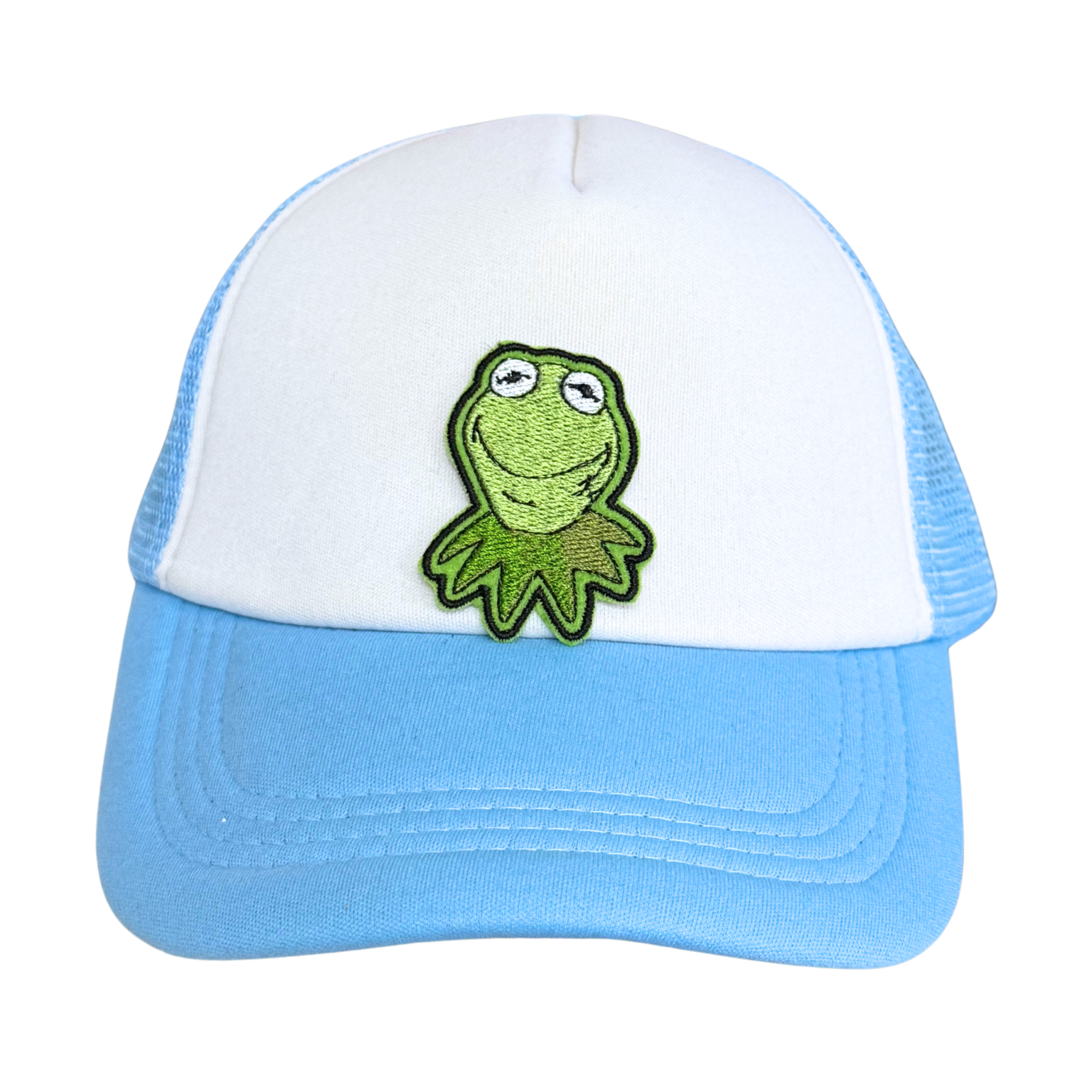 Light blue and white trucker hat with an embroidered frog patch attached.

