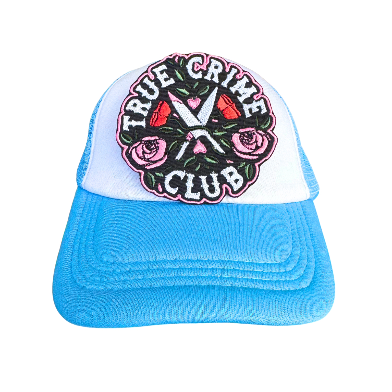 Trucker hat styled with the True Crime Club embroidered patch, perfect for crime documentary lovers and mystery fans.
