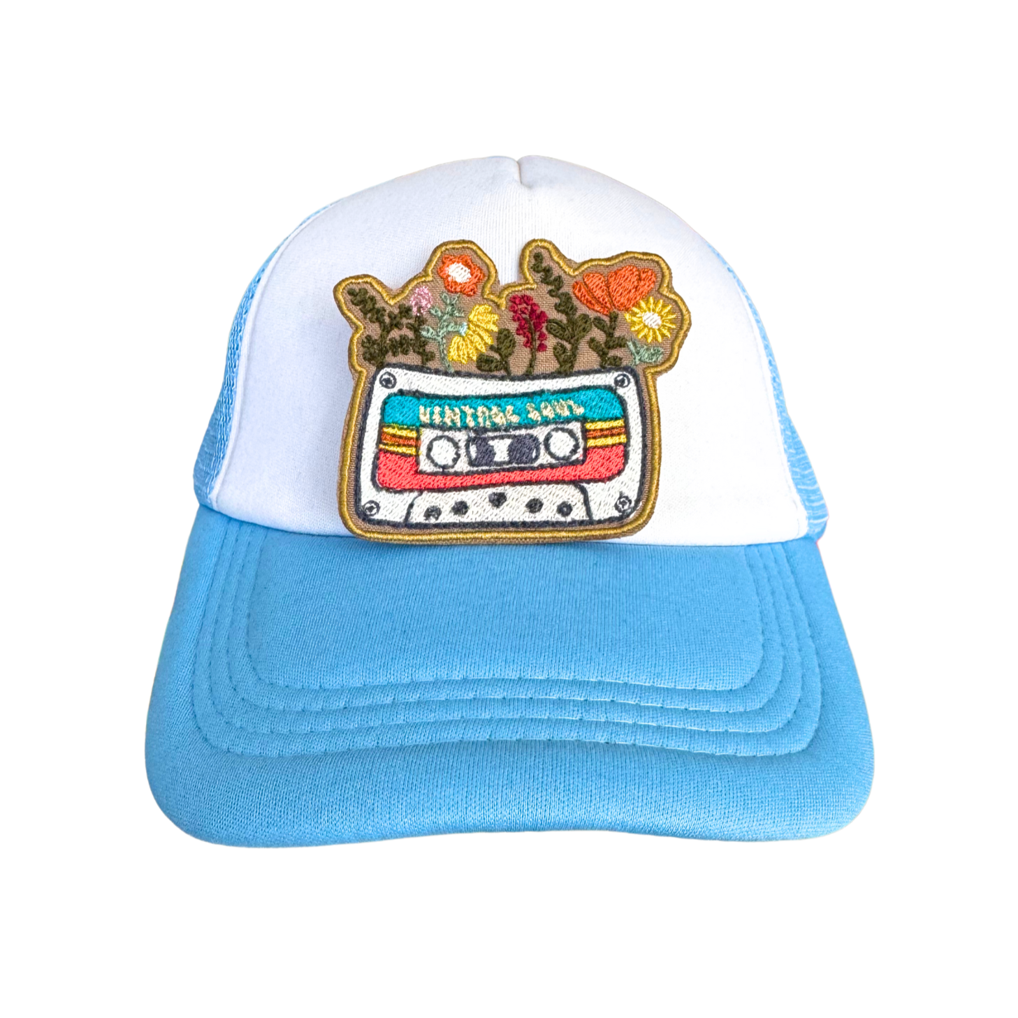 Trucker hat with a Vintage Soul embroidered patch featuring a cassette tape and floral design.

