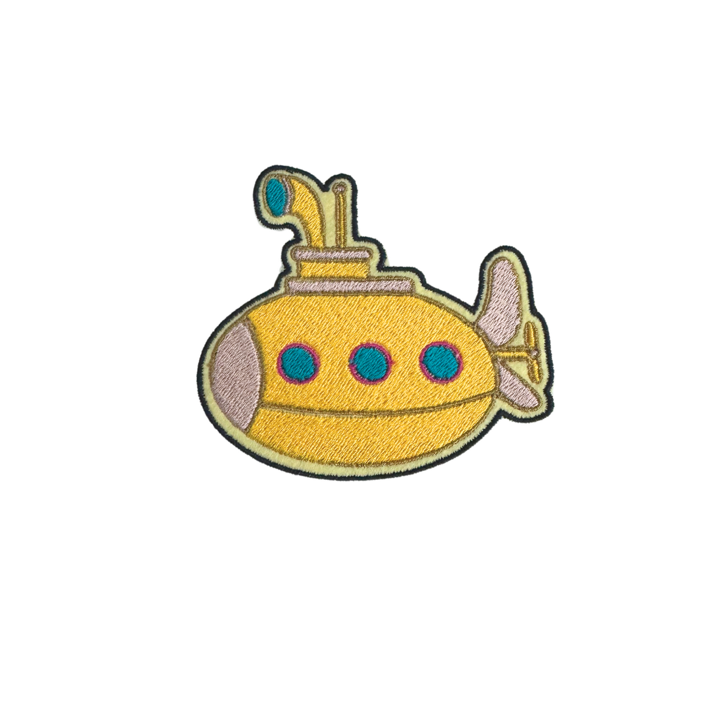 Handmade Yellow Submarine embroidered patch with vibrant yellow, blue, and tan details.
