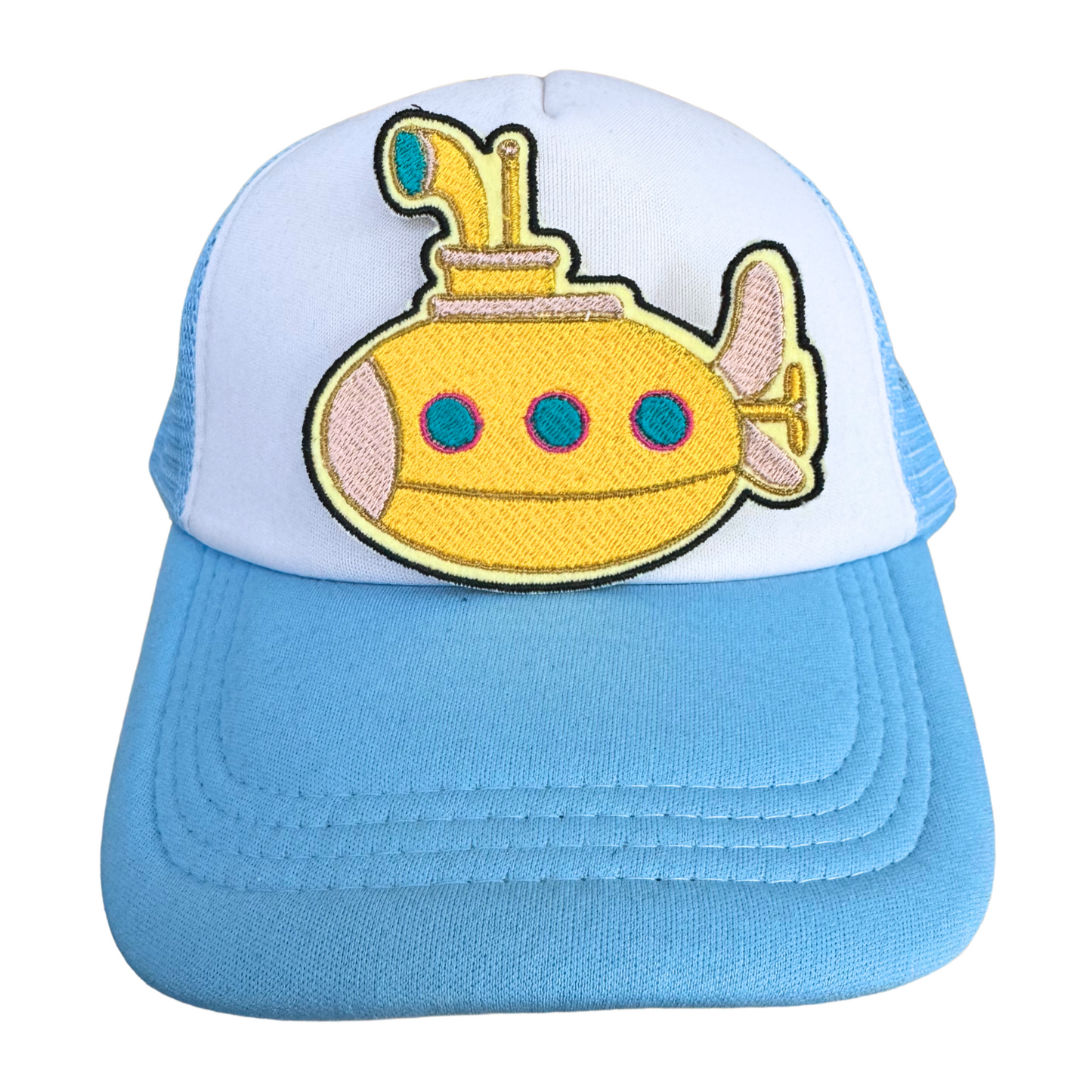 Blue and white trucker hat featuring the Yellow Submarine embroidered patch, handmade and ready to wear.
